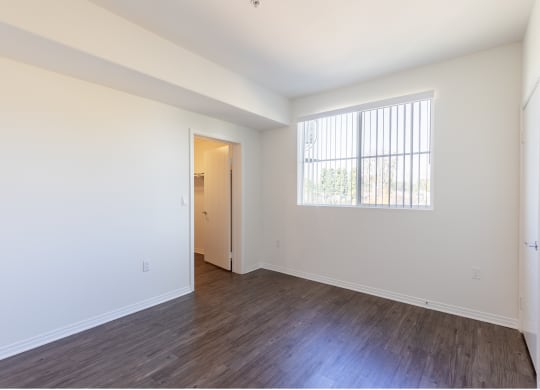 Hardwood laminate Flooring,Bedroom with window at Legacy Apartments, Northridge, 91325