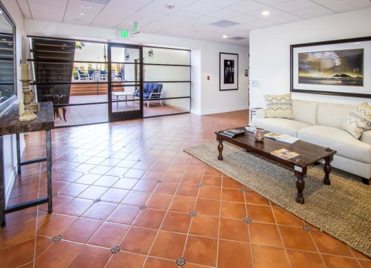 a living room with a couch and a coffee table at Le Blanc Apartment Homes, California, 91304
