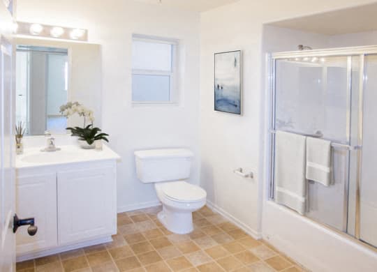 bathroom with white cabinetsat Toscana Apartments, Van Nuys California