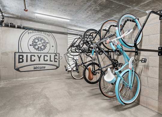 A bicycle parking area with a sign that says "Bicycle Welcome".