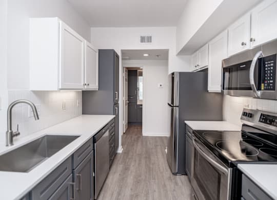 Electric Range In Kitchen at Whitney at the Heights, Houston, TX, 77008