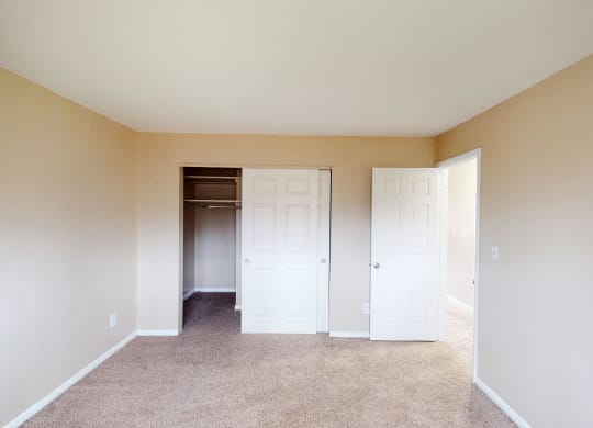 Bedroom with window light and bath at Sharondale Woods Apartments, Cincinnati, OH