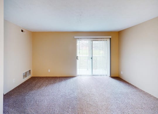 Living room with balcony at Quail Meadow Apartments, Ohio, 45240