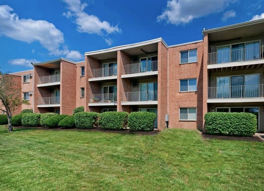 Building surrounded by greenery at Crown Pointe Apartments, Kentucky