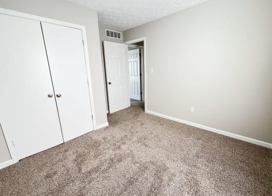 Bedroom with wooden floor at 450 on Keeneland Apartments, Kentucky