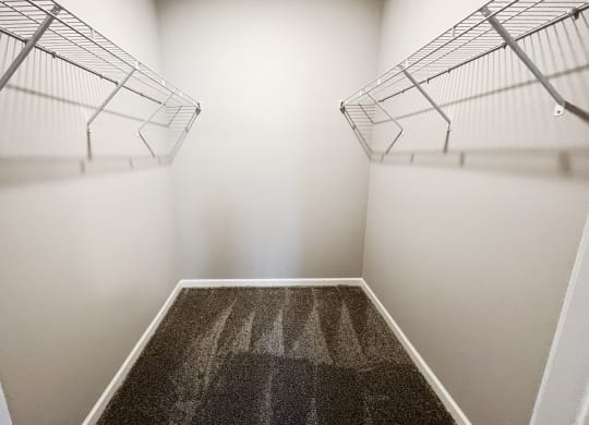 a spacious room with two closets and a carpeted floor  at Brookfield Village Apartments, Ohio