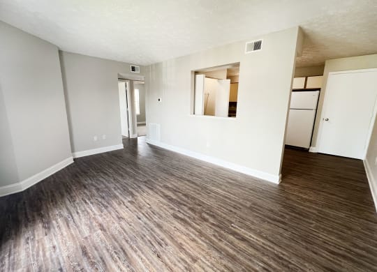 living room with white walls and wood flooring at 450 on Keeneland Apartments, Kentucky