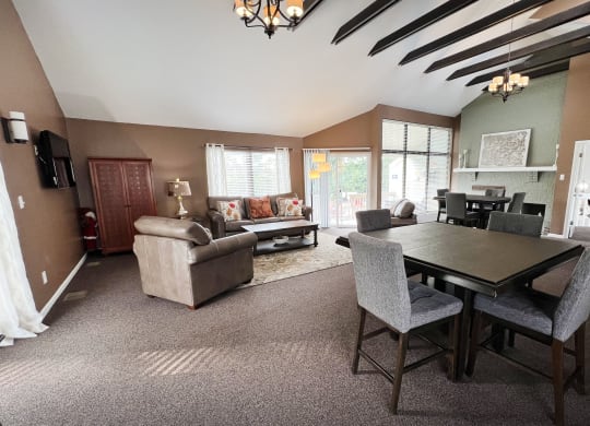 a large living room with a dining table and a couch  at Hunter's Creek Apartments, Cincinnati, OH