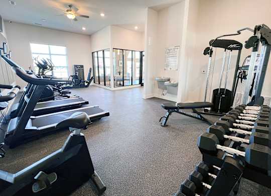 Gym with Elliptical Machines at Hebron Station Apartments, Hebron, KY