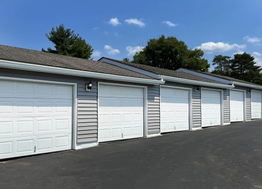 a row of garage doors on the side of a building at Deercross Apartments, Cincinnati, 45236