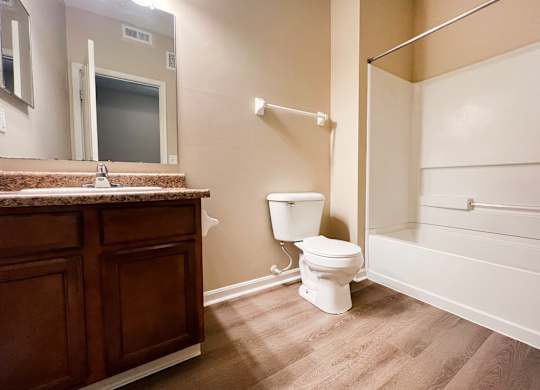 a bathroom with a toilet and a sink and a shower at Liberty Crossing, Columbus, 43235