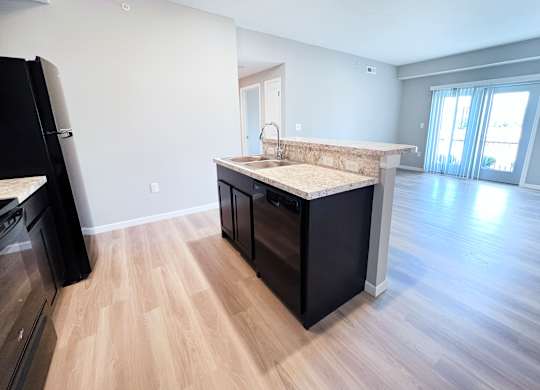Kitchen with Wooden Floor at Hebron Station Apartments, Hebron, KY