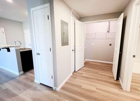 Closet with White Walls at Hebron Station Apartments, Hebron