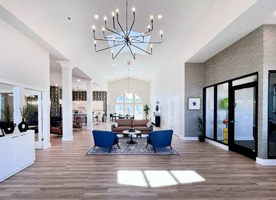 Clubhouse with a Chandelier at Hebron Station Apartments, Hebron