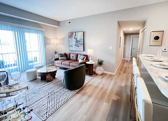 Living Room with Dining Area at Hebron Station Apartments, Hebron, KY, 41048