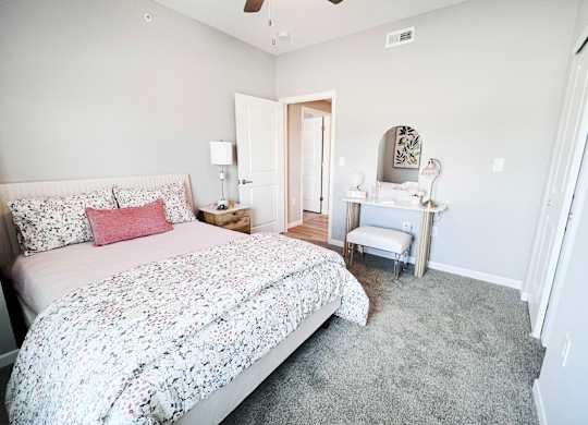 Bedroom with a Dresser at Hebron Station Apartments, Hebron, KY, 41048