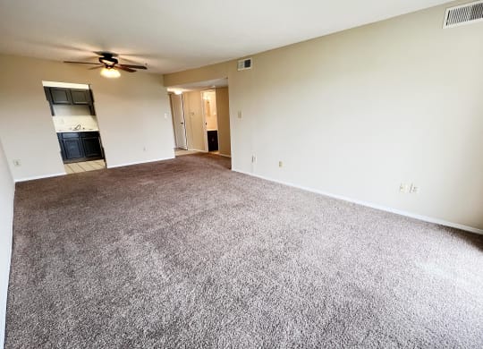 empty living room with carpet at Indian Lookout Apartments, Cincinnati, OH