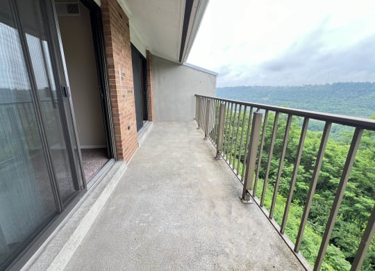 a balcony with a view of a building at Indian Lookout Apartments, Cincinnati, Ohio, 45238
