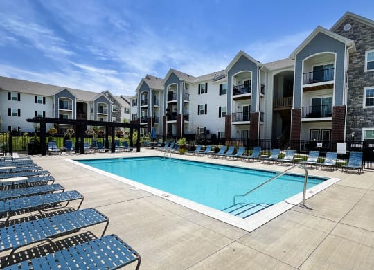 our apartments have a swimming pool and lounge chairs at Parkway Trails, Florence