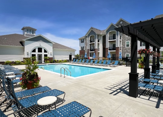 our apartments have a large pool and lounge chairs at Parkway Trails, Kentucky