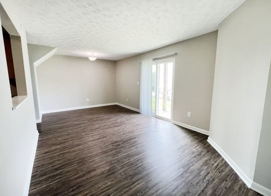 Living room with sunlight at 450 on Keeneland Apartments, Richmond
