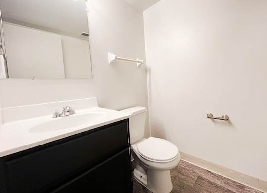 an empty bathroom with a toilet and a sink at Indian Lookout Apartments, Cincinnati, OH, 45238