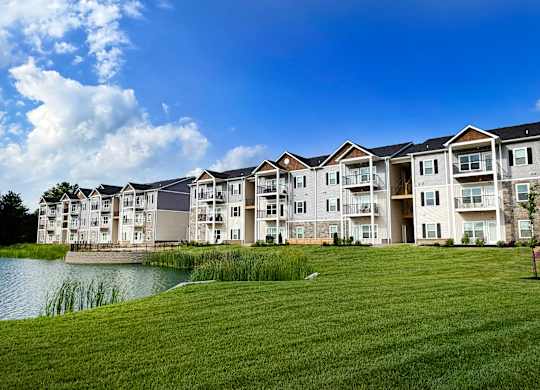 Apartment buildings with pond and landscaped grounds at The Meridian on 32 Apartments, Ohio, 45103