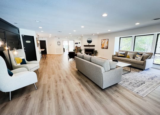 a living room with hardwood floors and white walls at Indian Lookout Apartments, Cincinnati, Ohio