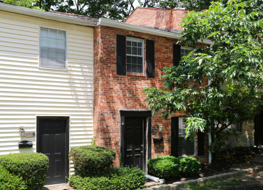 a brick and with black doors at Walnut Creek Townhomes, Ohio, 45236
