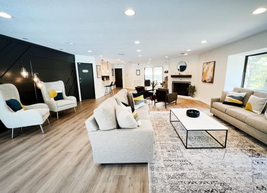 a living room with couches chairs and a coffee table at Indian Lookout Apartments, Cincinnati, 45238