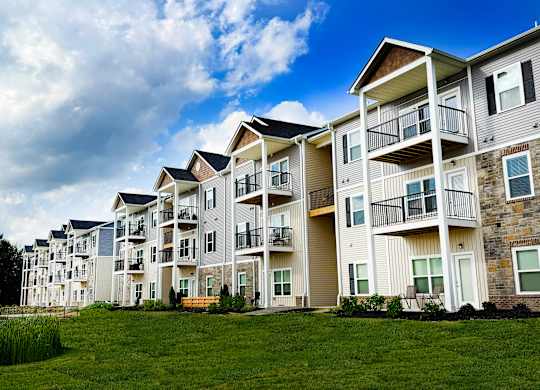 Multi story apartment buildings with covered balconies at The Meridian on 32 Apartments, Ohio