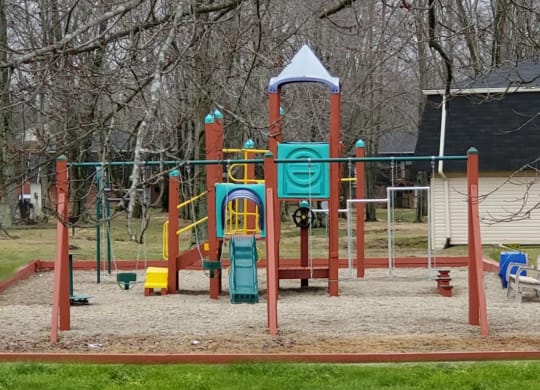 the playground at the park is cleaned and ready for the kids to play  at Crown Station Apartments, Ohio