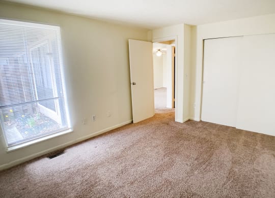 Living room area with wooden floor at Miamisburg by the Mall, Miamisburg