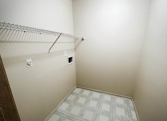 an empty room with a closet and a wire rack at Eagle Crest Apartments, Ohio