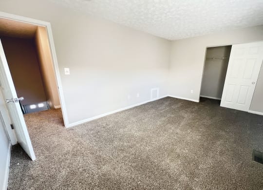 Carpeted Bedroom  at Revere Village Apartments, Centerville, Ohio