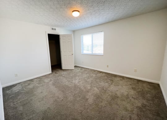 Bedroom With Carpet at Walton Ridge Apartments, Walton
