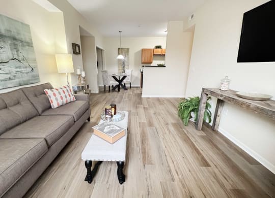 a living room with a couch and a coffee table at Residences at Northgate Crossing, Ohio, 43235