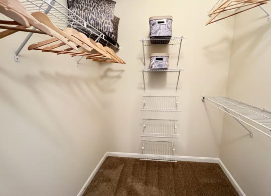 spacious closet with shelves and hooks at the falls apartments at Residences at Northgate Crossing, Ohio, 43235