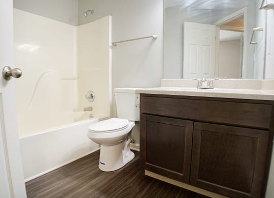a bathroom with a toilet and a sink  at Aberdine Place, Georgetown, Kentucky