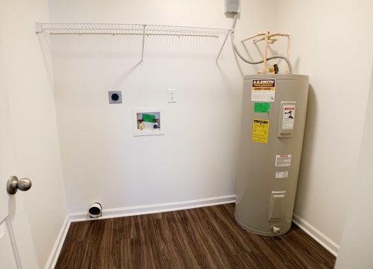 a water heater in the corner of a room  at Aberdine Place, Kentucky, 40324