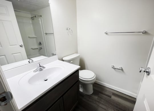 Bathroom with sink and cabinets at Deercross Apartments, Cincinnati