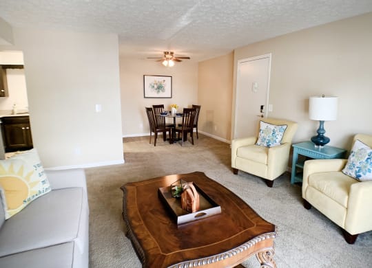 a living room with a couch and a coffee table at Knobs Pointe Apartments, New Albany, IN, 47150