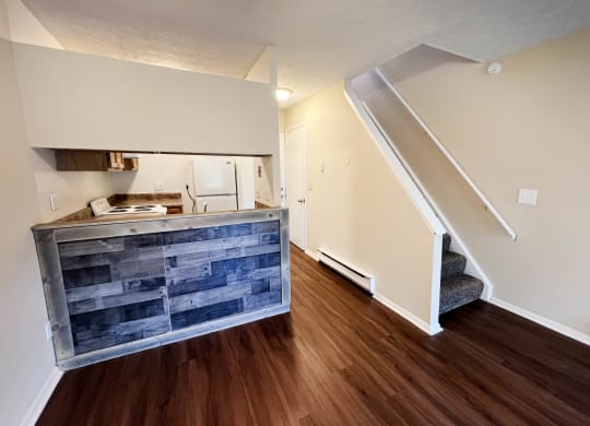 a photo of the kitchen and living room of a 560 square foot, 1 bedroom apartment at  at Concord Woods Apartments, Milford, OH, 45150