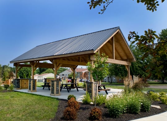 a pavilion with picnic tables in a park at Steeplechase Apartments, Loveland, 45140