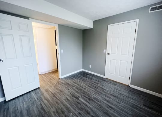 an empty room with two doors at Quail Meadow Apartments, Ohio, 45240