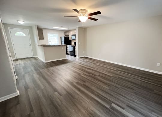 a photo of the living room and kitchen of a 560 square foot, 1 bedroom apartment at  at Woodhills Apartments, West Carrollton, OH, 45449