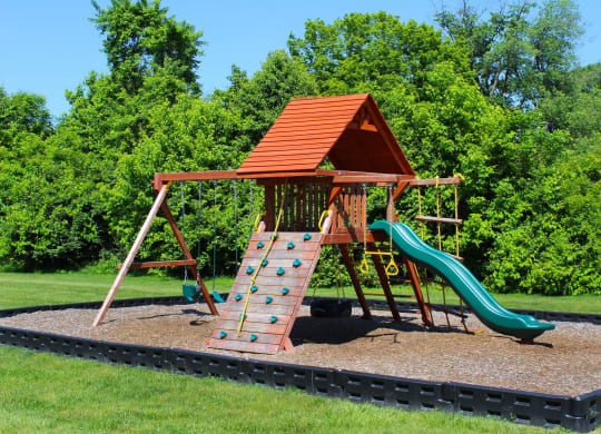 a playset with a swing set and a slide  at Four Worlds Apartments, Ohio, 45231