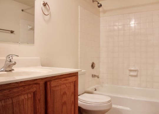 Bathroom with wooden cabinets at Miamisburg by the Mall, Miamisburg, OH, 45342