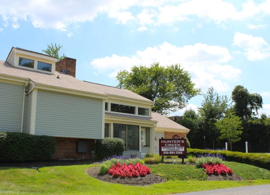 a house with a sign in front of it  at Hunter's Creek Apartments, Ohio, 45242