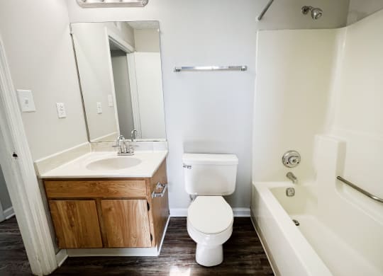 an empty bathroom with a sink toilet and bathtub at 450 on Keeneland, Richmond, KY